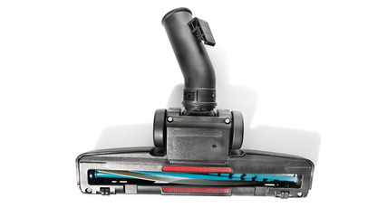 Black brush head for vacuum cleaner on white background.