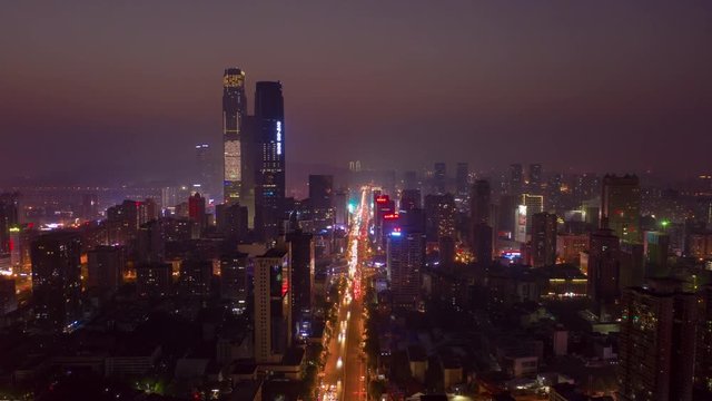 sunset night illumination changsha city center downtown traffic street aerial timelapse panorama 4k china