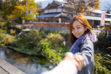 Naklejka premium Lovely Asian girl in style of japanese lady with acting smile on portrait photo.