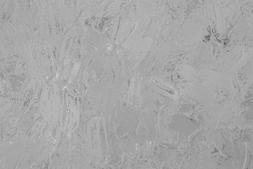 Abstract, gray background, chrome surface with a picturesque relief, stylized as artistic plaster