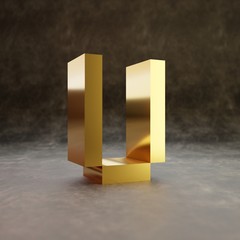 Pixel letter U uppercase. Golden glossy font on dark leather background. © Whitebarbie