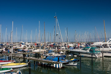 Fototapeta na wymiar Sailing boats and sailing yachts at marina Grömitz, Baltic Sea , Schleswig-Holstein, Baltic Sea, Germany