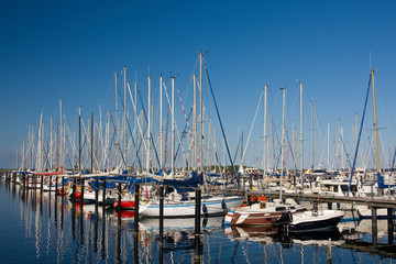 Fototapeta premium Sailing boats and sailing yachts at marina Grömitz, Baltic Sea , Schleswig-Holstein, Baltic Sea, Germany