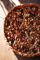 Walnut cake, five kinds of nuts, vegetarian dessert. Macro shooting.