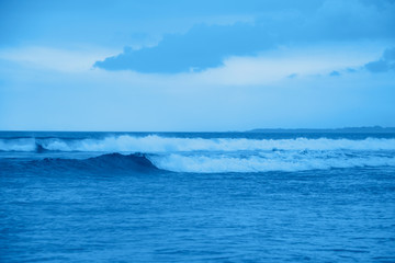 Fototapeta na wymiar Beautiful seascape in the trendy classic blue color of the year.