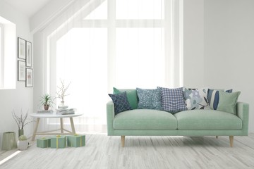 Fototapeta premium Stylish room in white color with sofa. Scandinavian interior design. 3D illustration