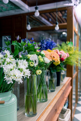 Fototapeta na wymiar Floral shop concept . Beautiful bouquet of mixed flowers. Handsome fresh bunch. Flowers delivery.