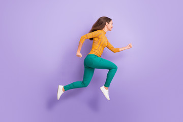 Fototapeta na wymiar Full length body size view of her she nice attractive lovely charming cheerful cheery glad purposeful energetic girl running fast isolated over violet purple lilac pastel color background