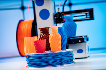3D Printer Plastic filament for 3D printer and printed products in the interior of the design office