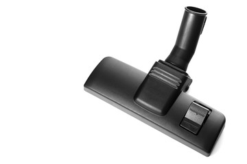 Black brush head for vacuum cleaner on white background.