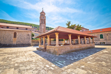Blato on Korcula island historic stone square town lodge and church view