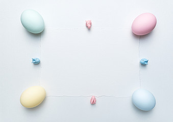 Easter background for greeting card and Easter sale announcement. Easter eggs on watercolor paint paper