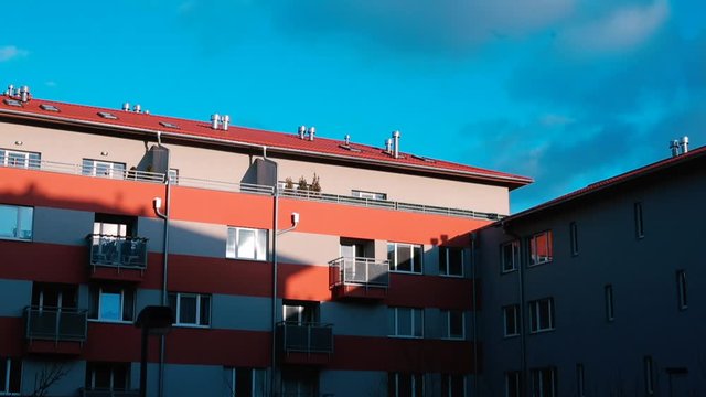 Timelapse, residential building in the sunlight.