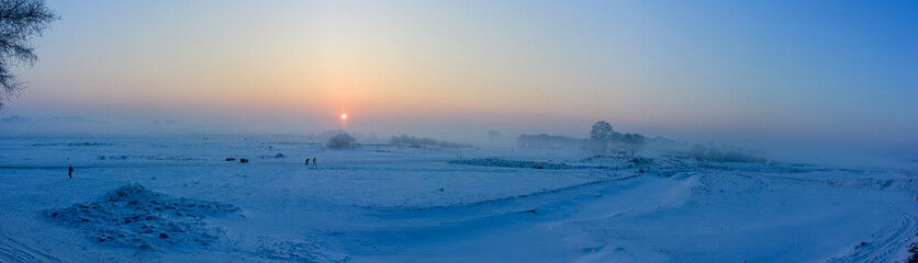 sunrise over frozen tundra