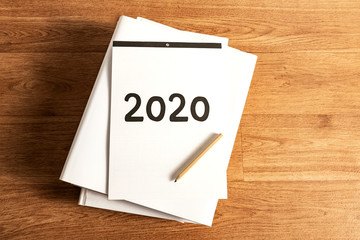 2020 Notebook on a wooden office table.