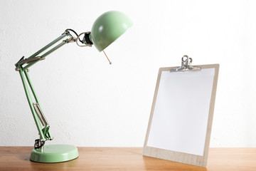 White paper on a wooden office table.