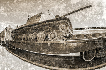 Old soviet military tank on the railway platform