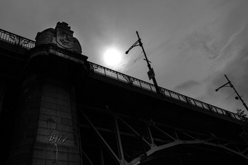 Bridge silhouette in Warsaw during the sunset. Black and white