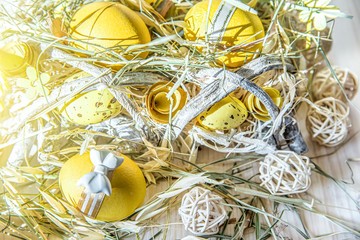 Yellow eggs in the nest. Easter background