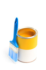 Can with yellow paint with brush isolated on white background