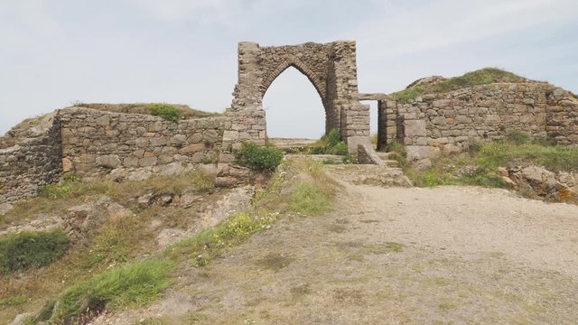 Grosnez Castle is a small castle ruin from the 14th century on the coast in the northwest of the channel island of Jersey