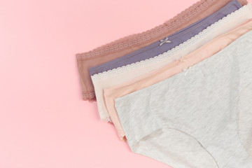 Female panties over pink  background - Image