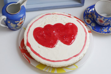 cheese cake with strawberry jam topping close up photo