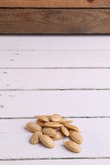 pumpkin seeds on color background