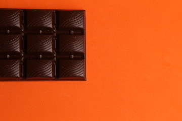 milk chocolate tablet in color background