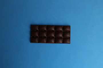 milk chocolate tablet in color background