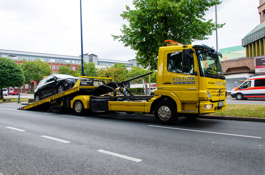 Dortmund, Germany - August 2, 2019: Widliczek tow truck loading the car after an accident.