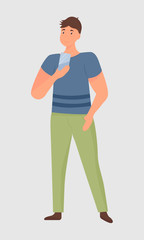 Illustration of a full-length young man who is looking at the phone. A man holds his hand in his trouser pocket. Vector. Flat cartoon style. Isolated on white background