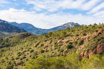 Fototapeta premium View of the mountains of the Natural Reserve of Lleberia from the Sanctuary of La Mare de Deu of Roca, Mont-roig, Catalonia, Spain