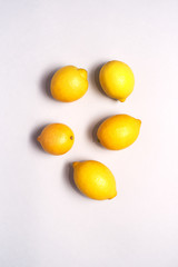 Overhead View Of  Fresh Lemons Against White Background