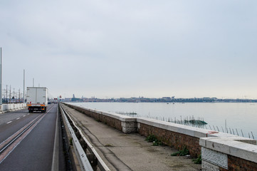Road with truck to Venice, Italy, Europe.