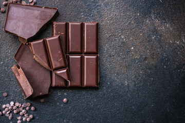 chocolate (delicious cocoa dessert, pieces ofbackground. top view. copy space sweets) menu concept....