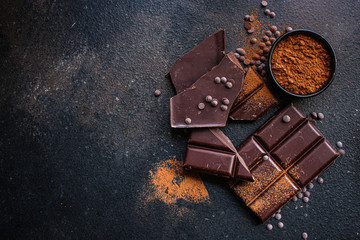 chocolate (delicious cocoa dessert, pieces ofbackground. top view. copy space sweets) menu concept....