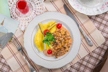 beef stroganoff with mushrooms and mashed potatoes