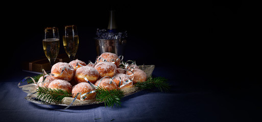 Fine Berlin donuts with jam filling and icing