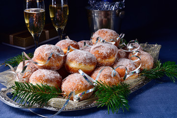 Fine Berlin donuts with jam filling and icing