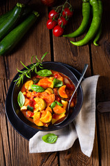 zucchini vegetarian ratatouille with tomato sauce and herbs