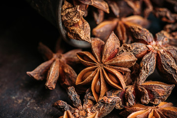 Dried anise stars on the rustic background. Selective focus. Shallow depth of field.