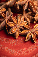 Dried anise stars on the rustic background. Selective focus. Shallow depth of field.