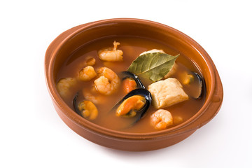 French bouillabaisse soup in bowl isolated on white background