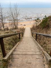 Fototapeta na wymiar wooden stairs to the beach