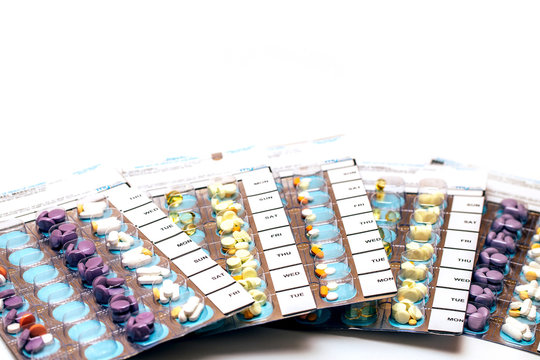 Pills in blisters for every day of the week for the morning, day, night time. Medications for patients in a hospital.