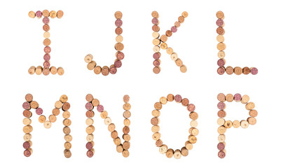 Set of letters from wine corks, alphabet isolated on a white background.
