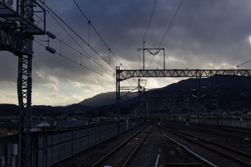 Japanese train station on a cloudy evening