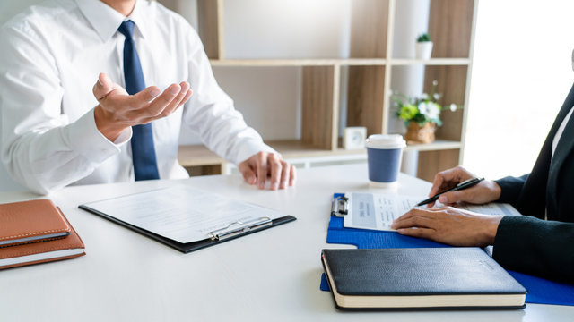 Job interview, Corporate business Employer or recruiter around the table during interviewing recruitment process concept.