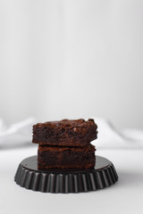 Stack of fudgy chocolate brownies